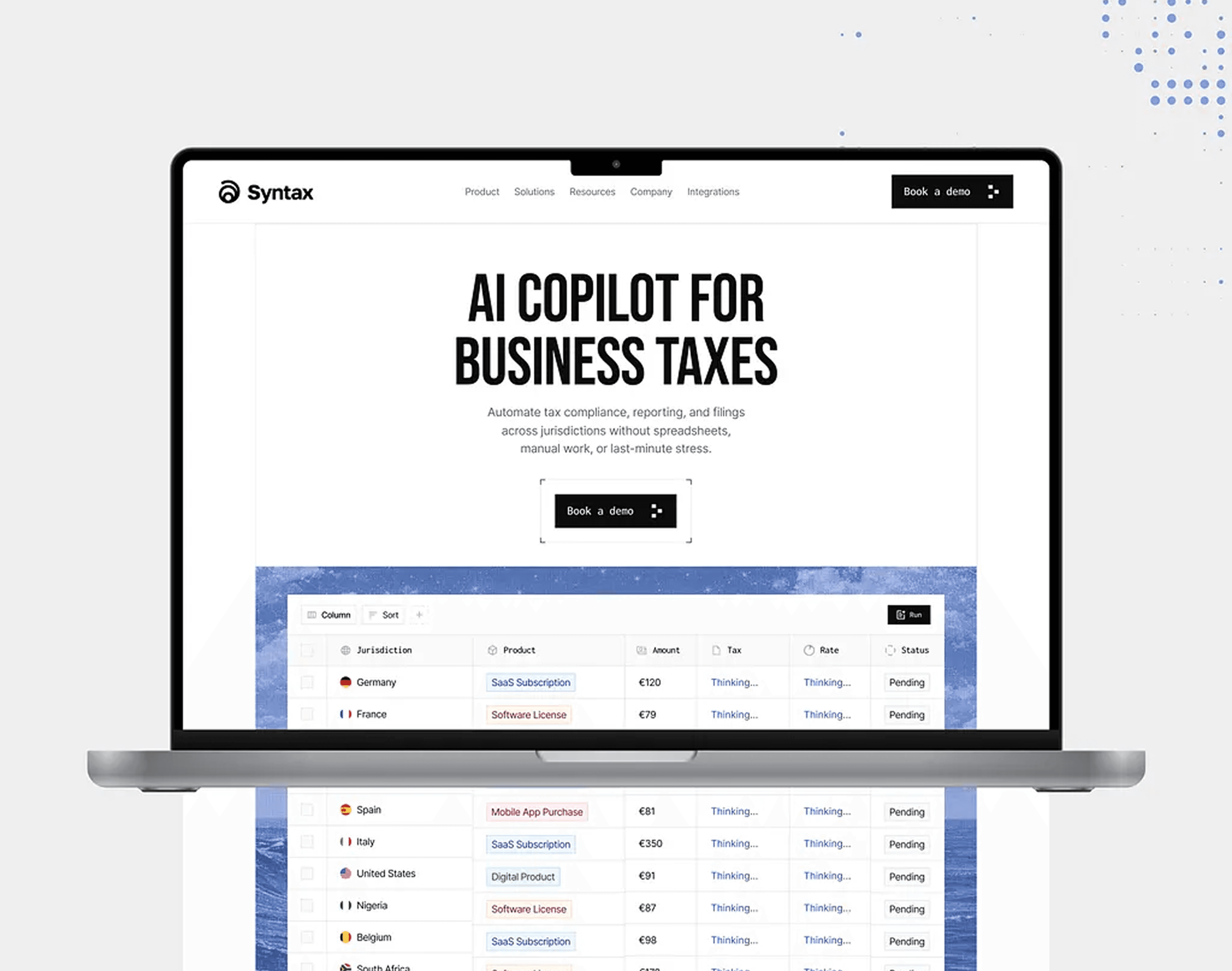 Syntax tax management platform shown on a laptop screen